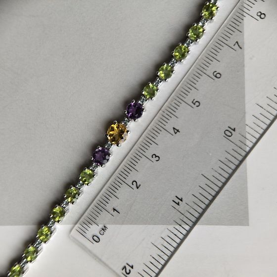 Silver bracelet with amethyst, citrine, chrysolite, topaz