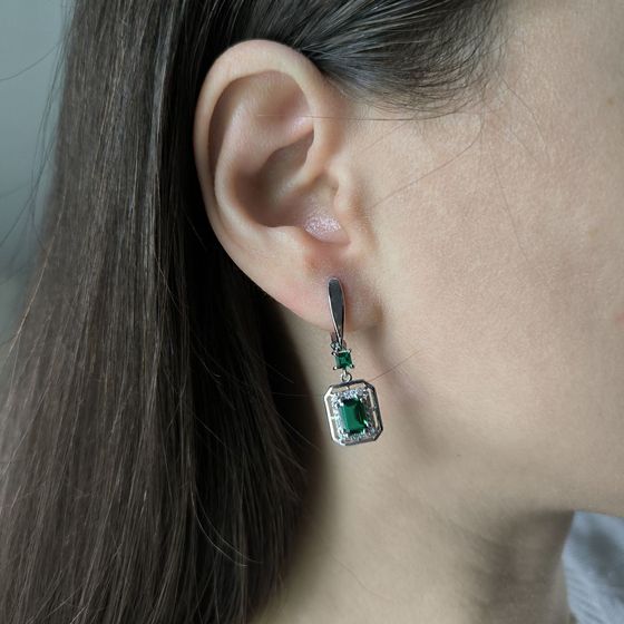 Silver earrings with a 2.367-carat nano emerald