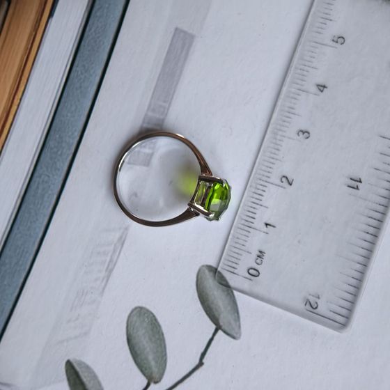 Silver ring with a 2.285-carat chrysolite