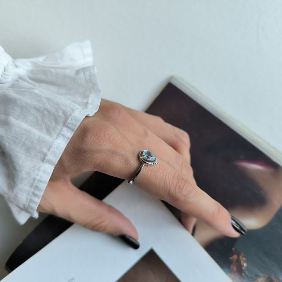 Silver ring with a 0.893-carat topaz and cubic zirconia