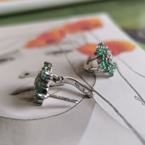 Silver earrings with emerald, fianites