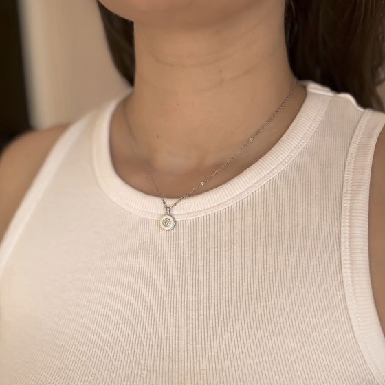 Silver pendant with ceramics