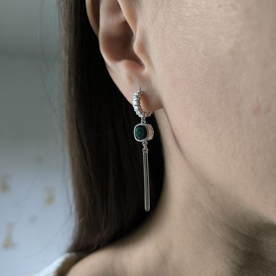 Silver earrings with a 1.892-carat nano emerald
