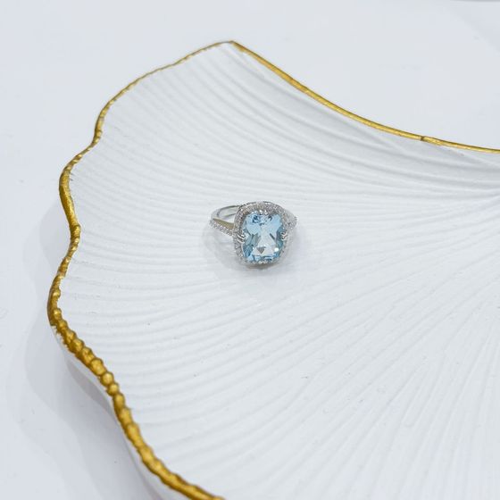 Silver ring with a 6.507-carat topaz and cubic zirconia