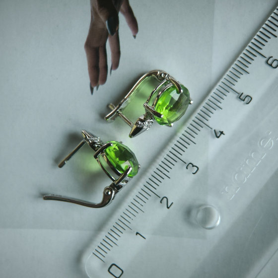 Silver earrings with a 6.685-carat chrysolite and cubic zirconia