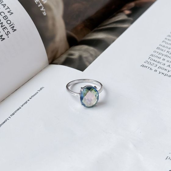 Silver ring with a mystic topaz