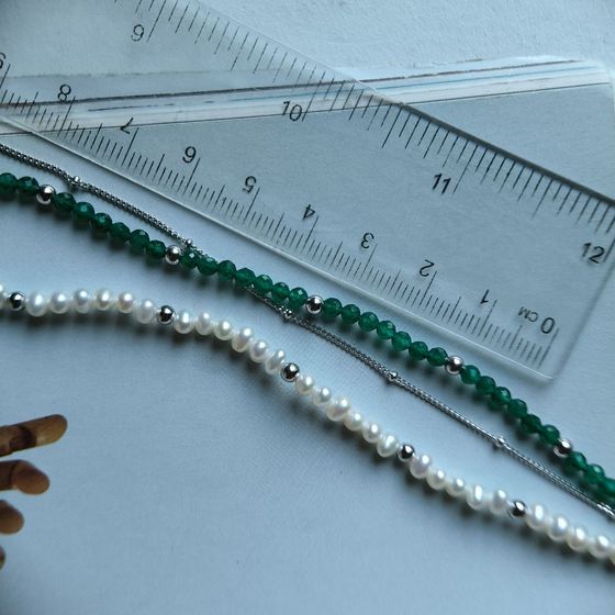 Silver necklace with baroque pearls, green jadeyed