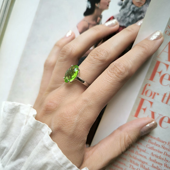 Silver ring with a 4.855-carat chrysolite