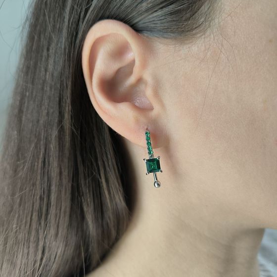 Silver earrings with a 2.295-carat nano emerald