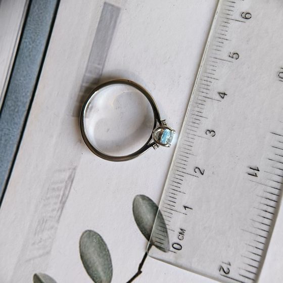 Silver ring with a 0.936-carat topaz and cubic zirconia