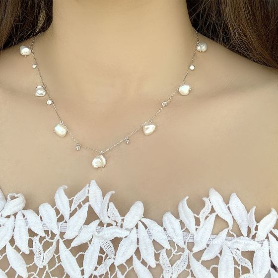 Sterling silver necklace with baroque pearls 56.286ct