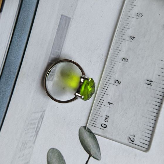 Silver ring with a 3.89-carat chrysolite
