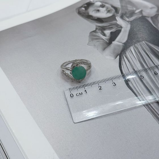 Silver ring with emerald, fianites