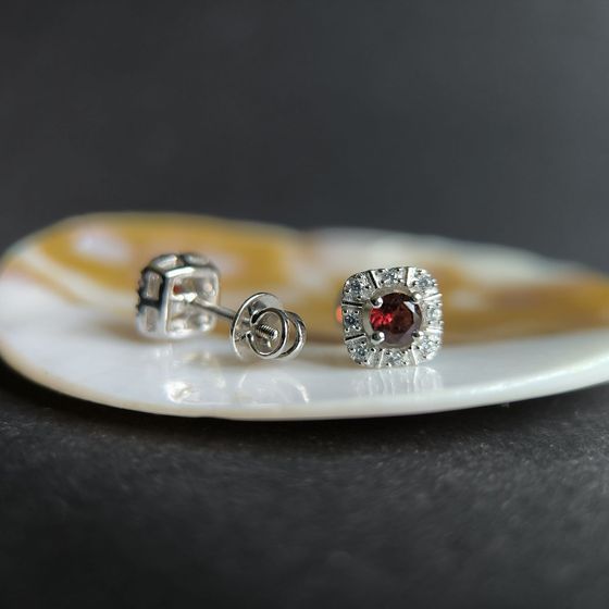 Silver earrings with a 0.949-carat garnet and cubic zirconia