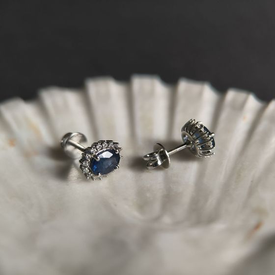 Silver earrings with a 2.237-carat sapphire and cubic zirconia
