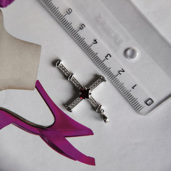 Silver cross with 1.37ct garnet and cubic zirconia