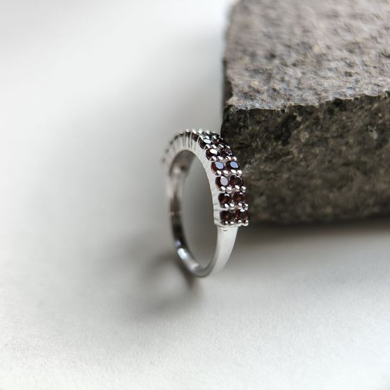Silver ring with a garnet