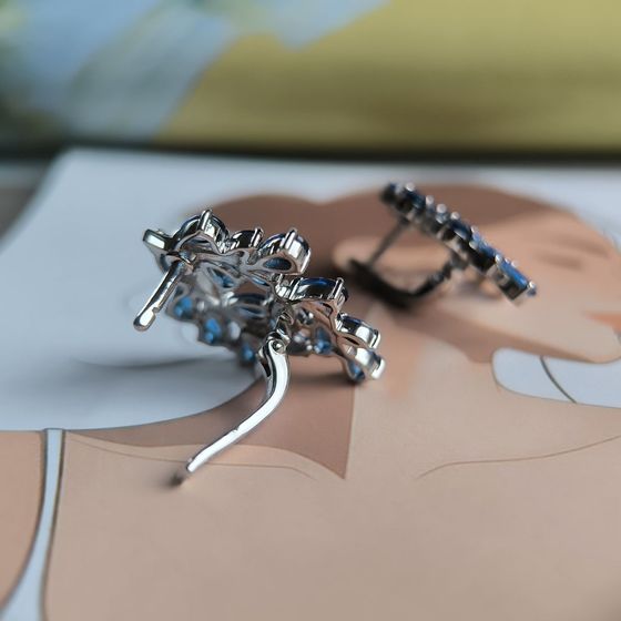 Silver earrings with a 4.31-carat nano sapphire
