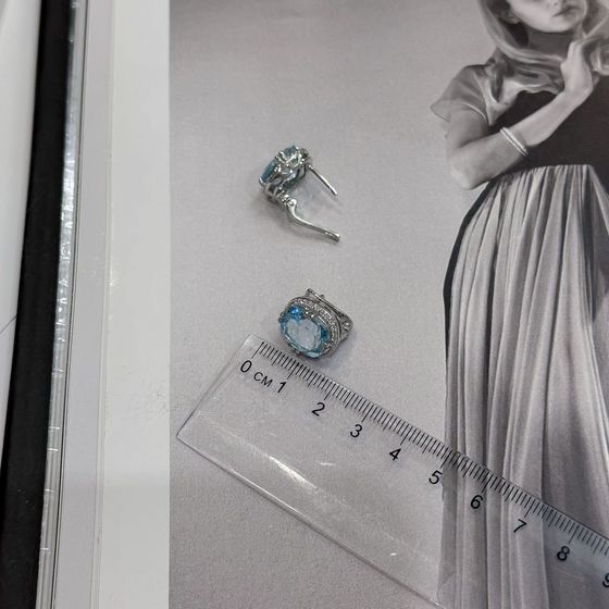 Silver earrings with a 12.432-carat topaz and cubic zirconia