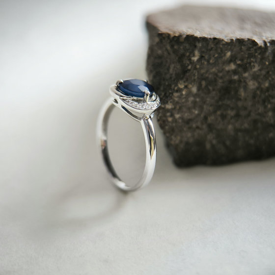 Silver ring with a sapphire and cubic zirconia