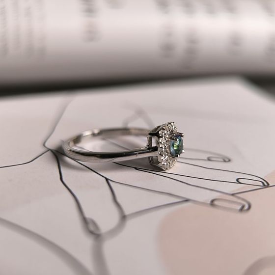 Silver ring with a 0.315-carat mystic topaz