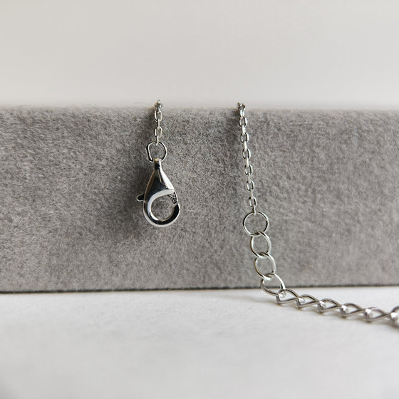Silver bracelet with mother-of-pearl and cubic zirconia