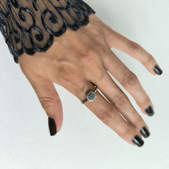 Silver ring with a 0.36-carat emerald and cubic zirconia