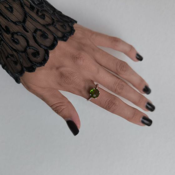 Silver ring with a 2.285-carat chrysolite