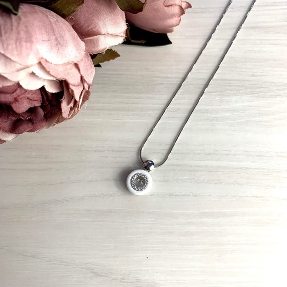 Silver pendant with ceramics