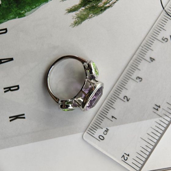 Silver ring with amethyst, chrysolite