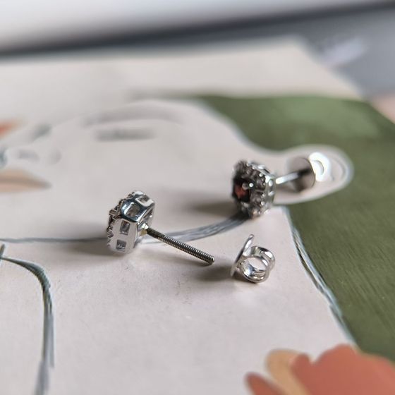 Silver earrings with a 0.949-carat garnet and cubic zirconia