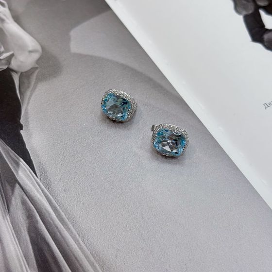Silver earrings with a 12.432-carat topaz and cubic zirconia