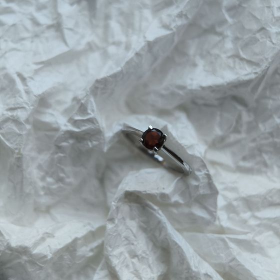 Silver ring with a 0.595-carat garnet