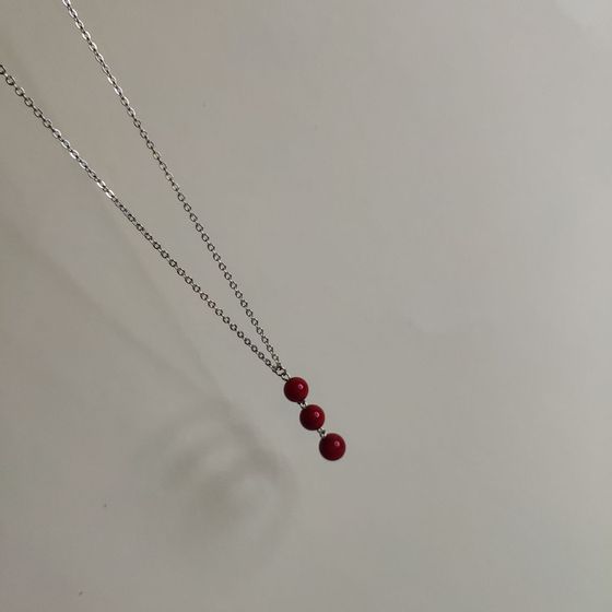 Срібне кольє з коралом