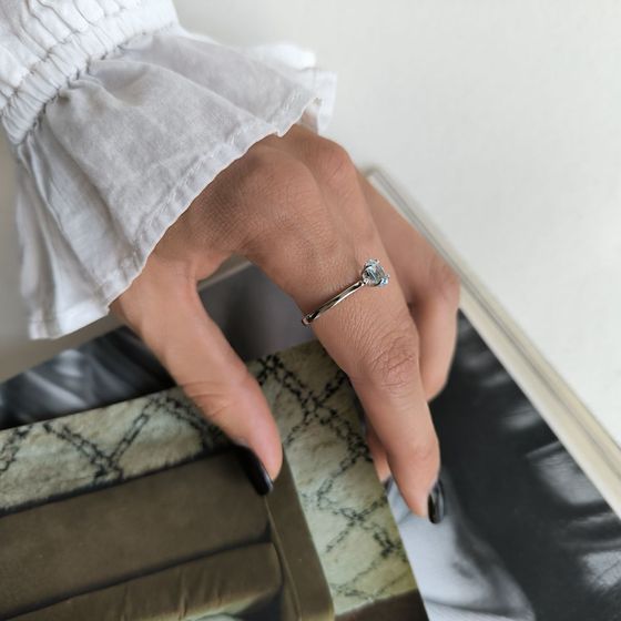 Silver ring with a 0.936-carat topaz and cubic zirconia