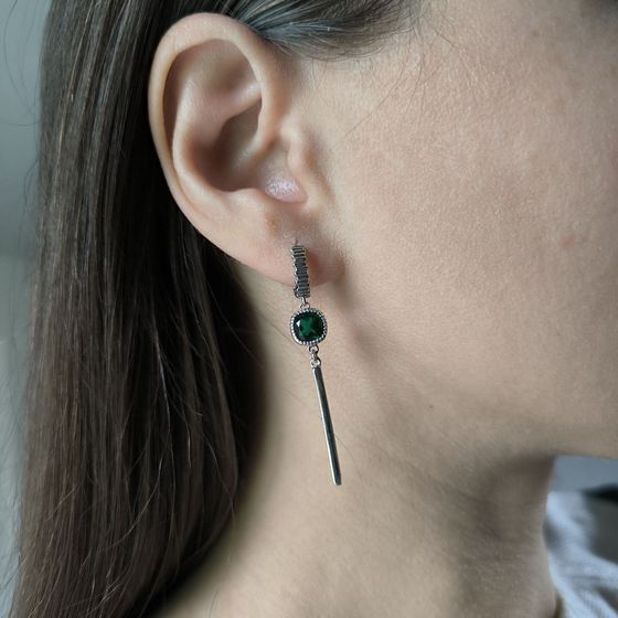 Silver earrings with a 1.892-carat nano emerald