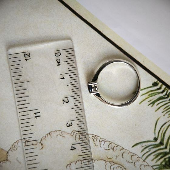 Silver ring with a sapphire