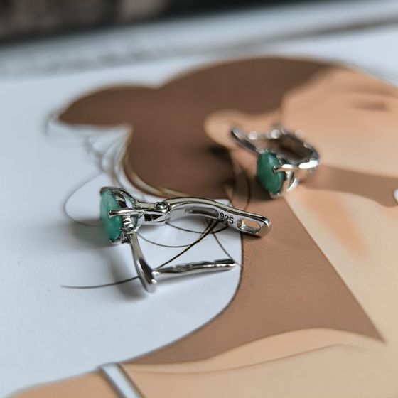 Silver earrings with emerald, fianites