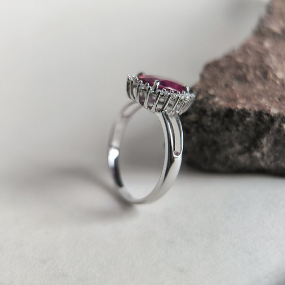 Silver ring with ruby, fianites
