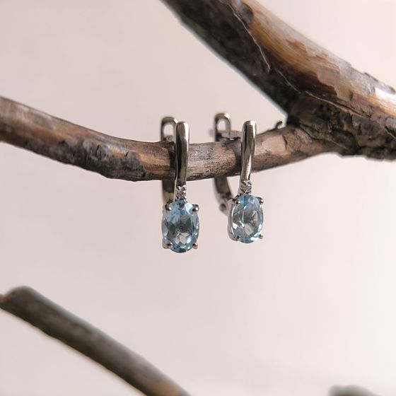 Silver earrings with a 1.874-carat topaz and cubic zirconia