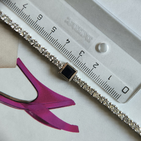 Silver bracelet with a sapphire