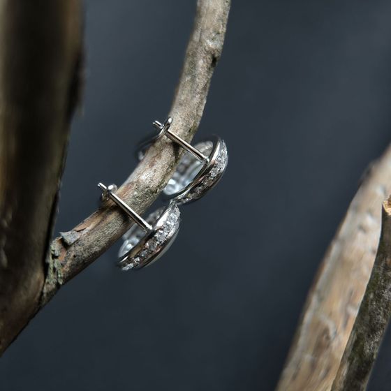 Silver earrings with mother-of-pearl, fianites