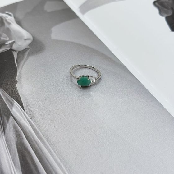 Silver ring with emerald, fianites