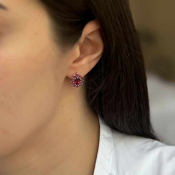 Silver earrings with a 2.94-carat garnet