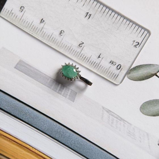 Silver pendant with a 0.907-carat emerald and cubic zirconia