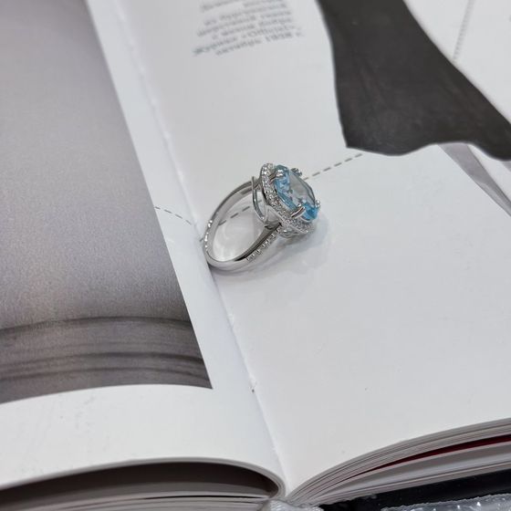 Silver ring with a 6.507-carat topaz and cubic zirconia