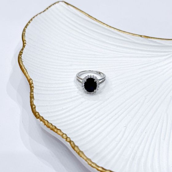 Silver ring with a sapphire and cubic zirconia