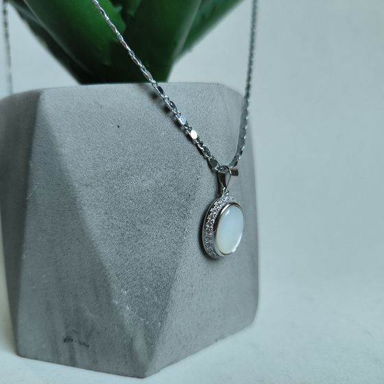 Silver pendant with phianites, mother-of-pearl