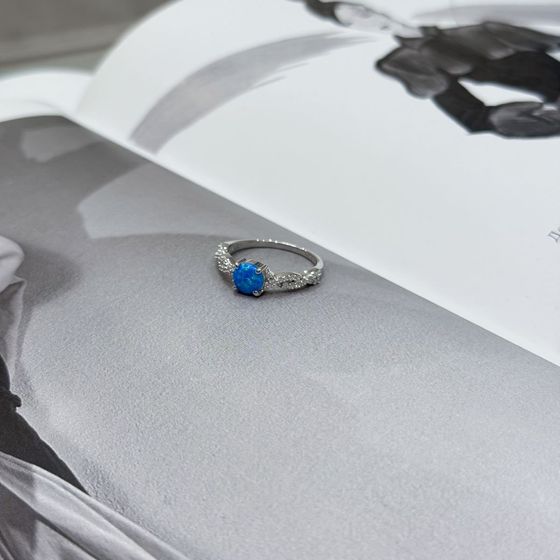 Silver ring with opal and cubic zirconia