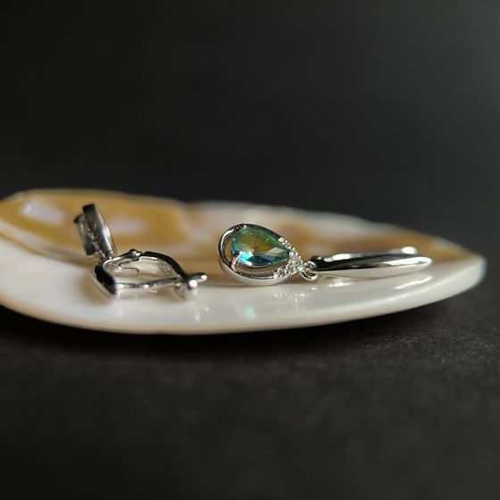 Silver Earrings with a 1.06-carat Mystic Topaz